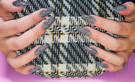 Acrylic nail extension, manicure, nail correction, hands in the foreground. reflective design....