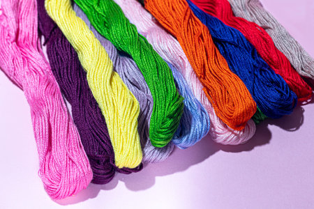 Cotton threads for sewing. Multicolored palette, handmade process. copy space