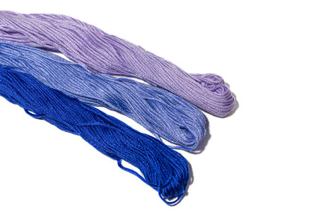Cotton threads for sewing. Multicolored palette, handmade process. copy space