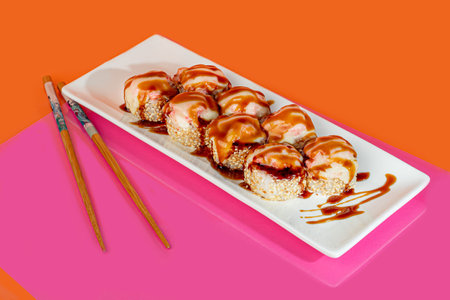 Sushi sets, rolls with caviar, shrimp, tuna and avocado and Philadelphia cheese, on a white plate.の写真素材