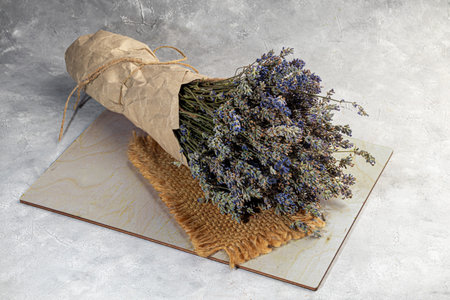 Bouquet of dried lavender, lavender soap, oil and candle tea. Healthy lifestyle, light background. copy spaceの写真素材