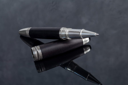 Fountain pen on marble and gray background. Gift concept. Copy spaceの写真素材