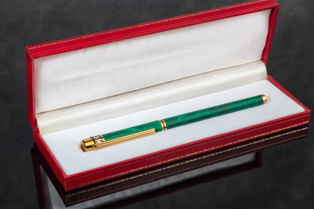 Fountain pen on marble and gray background. Gift concept.の写真素材