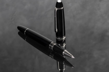 Fountain pen on marble and gray background. Selective focus. Office interior Copy spaceの写真素材