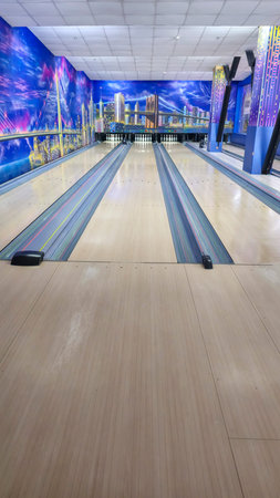 Sports hall for bowling. Pin lanes and colorful balls. Family recreation. Healthy lifestyleの写真素材