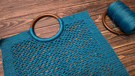 Knitting a product from green threads with a crochet hook. Step-by-step instructions for knitting a...