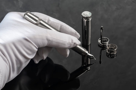 Fountain pen with box on dark gray background.の写真素材