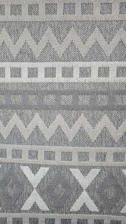 Weaving patterns on carpets. Combination of different colors, abstract designs. Sale of floor...