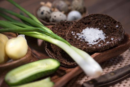 Potatoes, tomatoes, cucumber and onionsの写真素材