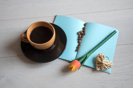 Coffee Cup with notebook  and pen