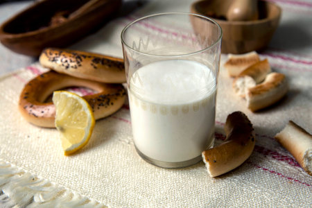 Yogurt and bagels on the tableの写真素材