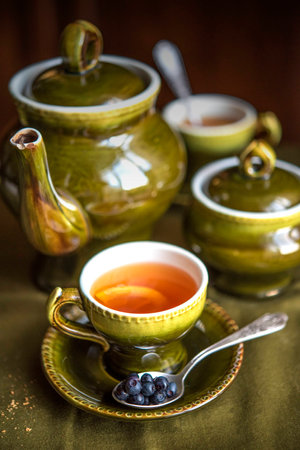 Tea and olive setの写真素材