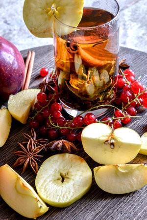 Tea Cup, apples, red currantsの写真素材
