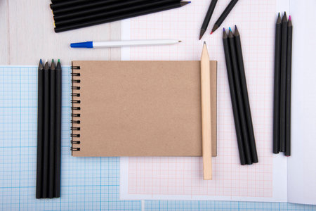 Office supplies, pen, pencil, colored notebooks, top viewの写真素材