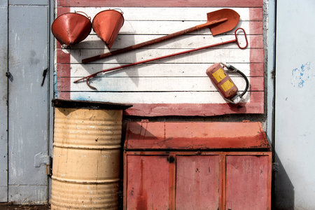 Fire shield. A crowbar, shovel, fire extinguisher, bucket