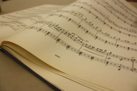Sheet music printed on beautiful, old and yellowed paper. Musical scoreの写真素材