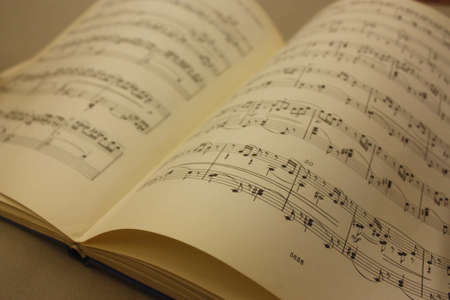 Sheet music printed on beautiful, old and yellowed paper. Musical scoreの写真素材