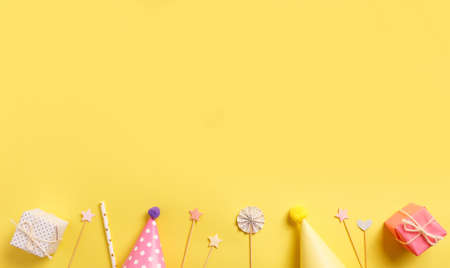Bright gift boxes on a yellow background. Concept for birthday, mother's day, valentines day, father's dayの写真素材