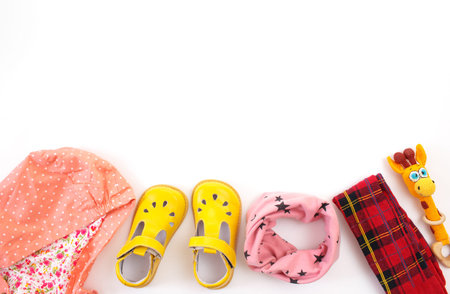 children's clothing and toys on a white background.