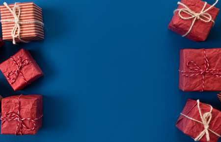 lots of Christmas gifts on pink background.の写真素材