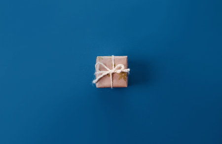 lots of Christmas gifts on pink background.