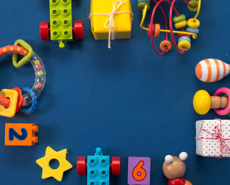 Colorful frame of toys for children on a blue backgroundの写真素材