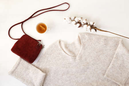 A set of neatly laid out stylish women's clothing and shoes on a white background top viewの写真素材