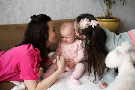 a caring mother calms a frustrated child