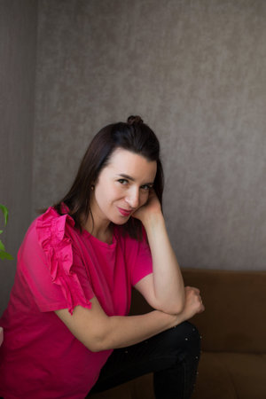 portrait of a girl in a pink blouseの写真素材