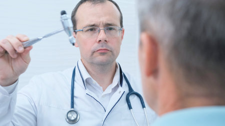 Doctor and patient discussing something while sitting at the table. Medicine and health care concept.の写真素材