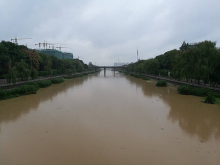 Murky river waters in the cityの写真素材