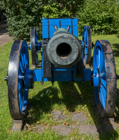 Blue canon with great wheels at fortress Bourtange in the province Groningen.のeditorial素材