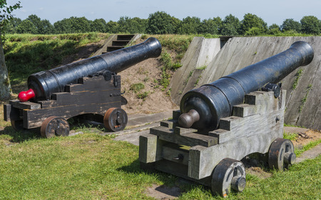 Two black canons at fortress Bourtange in the Province Groningenのeditorial素材