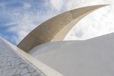 Part of Concert hall of architect Calatrava in Santa Cruz de Tenerife on the Canary Islands with clouds.の写真素材