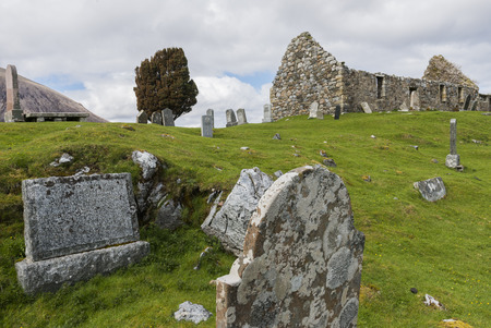 Graveyard with chapel and gravestones near Loch Cill Chriosd in the Highlands of Scotland image Daan Kloeg Commee.のeditorial素材