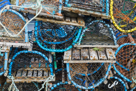 crab and lobster traps in different sizes and colors.の写真素材