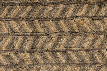 Wall of brown grass sods  of a house at Byggdasafn Skagfirdinga on Iceland.の写真素材