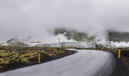 Road and geothermal energy works of Blue Lagoon in Iceland on a rainy day.の写真素材
