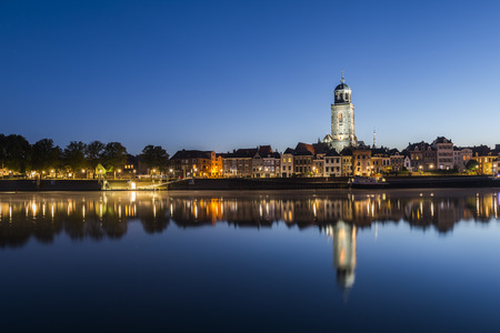 Deventer at the IJssel in the morning during blue hour with the Great Church or Lebuinuskerk in the province Overijssel, The Netherlands.のeditorial素材