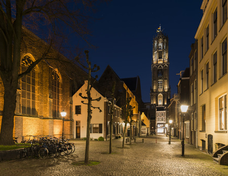 Utrecht, The Netherlands - March 27, 2017: Buurkerkhof at night with the Dom (church), bikes and  monumental houses.のeditorial素材