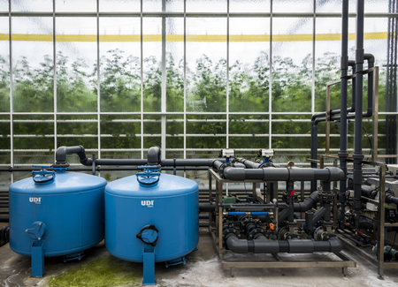 Harmelen, The Netherlands - April 3, 2017: Greenhouse of tomatoes with machinery, water supply and nutrition.のeditorial素材