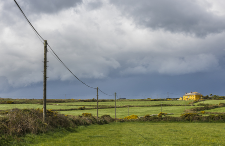 Cornwall, England - April 26, 2017: Cornish landscape at Gurnard's Head, Cornwall, England wit dark clouds and ocean.のeditorial素材