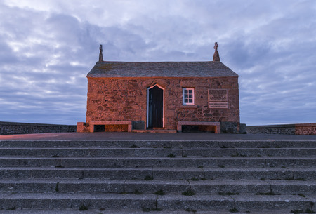 Saint Ives, England - April 28, 2017: Saint Nicholas Chapel in Saint Ives during sunset.のeditorial素材