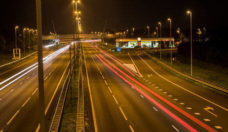 Woudenberg, Netherlands - August 21, 2017: Highway in the night with cars with white and red lights...