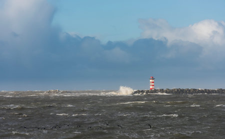 Storm at the North Sea at the Northpier at IJmuiden in Noord-Hollandの写真素材