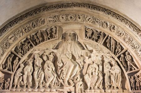 Vezelay, France - July 29, 2018: Main tympan of the romanesque church and abbey of Vezelay in Yonne, France.のeditorial素材