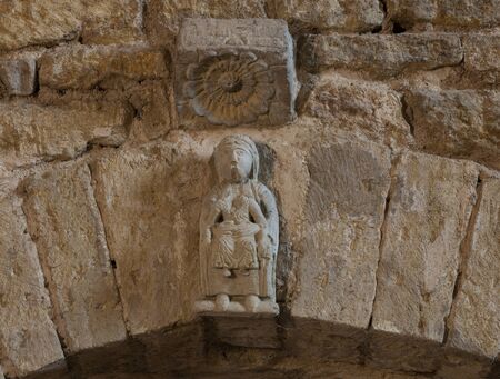 Anzy-le-Duc, France - August 1, 2018: Small sculpture in the historical romanesque church of Anzy le Duc, Saonne-et-Loire, France.のeditorial素材