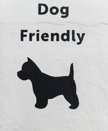Lymington, England - October 25, 2018: Sign of  dog friendly restaurant.のeditorial素材