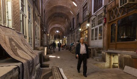 Tabriz, Iran - May 12, 2019: Great Bazaar in Tabriz with man at the carpet market, Iran.のeditorial素材