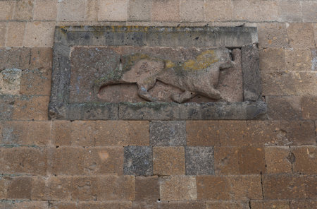 Ani, Turkey - May 9, 2019: Statue of a lion in the gate of the old Armenian town Ani.のeditorial素材